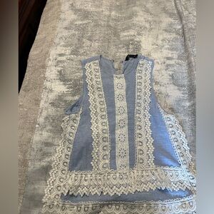 Blue Sleeveless Top with Lace Details